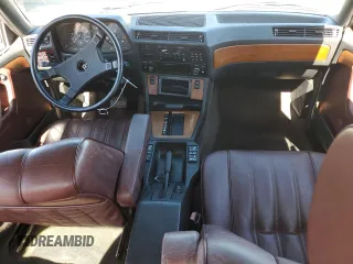 1985 BMW 7 Series 735i с VIN WBAFH8402F0638431, выставлен на аукционе Copart как лот 82026114 с пробегом 98 137 миль миль и Списание • Salvage title. История ставок и продаж доступна на DreamBid. Изображение 8.