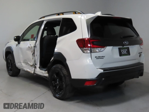 2023 Subaru Forester Wilderness with VIN JF2SKAMC7PH464218, listed as a Copart auction lot 50942575 with 8,827 mi miles and Salvage Title. Bid and sale history available at carsss.com. Image 4.