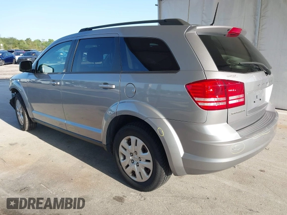 2020 Dodge Journey SE Value with VIN 3C4PDCAB7LT261203, listed as a IAAI auction lot 41963451 with 69,612 mi miles and . Bid and sale history available at carsss.com. Image 3.