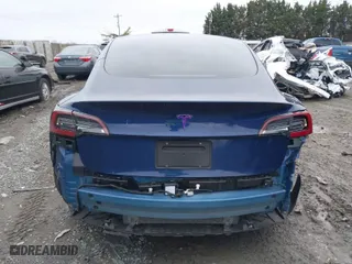 2023 Tesla Model 3 with VIN 5YJ3E1EA7PF446874, listed as a IAAI auction lot 41133303 with 47,748 mi miles. Bid and sale history available at carsss.com. Image 16.