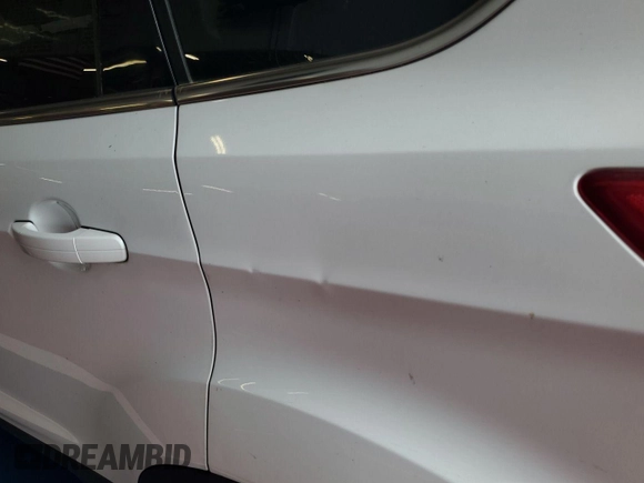 2013 Ford Escape SE with VIN 1FMCU9G92DUD72105, listed as a IAAI auction lot 42731657 with 213,477 mi miles and . Bid and sale history available at DreamBid. Image 24.