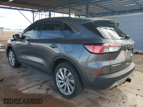 2021 Ford Escape Titanium with VIN 1FMCU9J92MUA08792, listed as a Copart auction lot 59270215 with 29,194 mi miles and Salvage title. Bid and sale history available at DreamBid. Image 2.