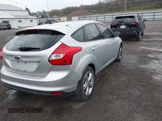 2012 Ford Focus SE z VIN 1FAHP3K27CL152803, wystawiony jako IAAI lot #42058556 z przebiegiem 181 717 mil mil oraz . Historia ofert i sprzedaży dostępna na DreamBid. Obrazek 4.