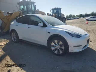 2023 Tesla Model Y Long Range with VIN 7SAYGDEE3PF614078, listed as a Copart auction lot 54539645 with 39,194 mi miles and Salvage Title. Bid and sale history available at DreamBid. Image 4.
