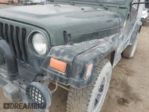 1998 Jeep Wrangler Sport with VIN 1J4FY19S9WP722431, listed as a IAAI auction lot 41872702 with 197,503 mi miles and . Bid and sale history available at DreamBid. Image 6.
