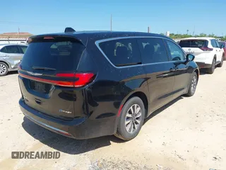2024 Chrysler Pacifica Hybrid Select with VIN 2C4RC1S70RR169467, listed as a IAAI auction lot 42448734 with 38,062 mi miles and . Bid and sale history available at DreamBid. Image 4.