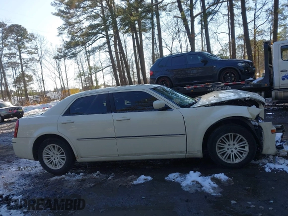 2009 Chrysler 300 Touring with VIN 2C3KA53V99H621745, listed as a IAAI auction lot 41604655 with 115,004 mi miles. Bid and sale history available at carsss.com. Image 14.