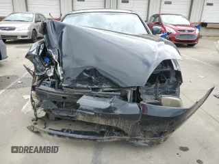 2006 Hyundai Tiburon GT z VIN KMHHN65F66U215304, wystawiony jako Copart lot #56141635 z przebiegiem 149 118 mil mil oraz Szkoda całkowita • Salvage title. Historia ofert i sprzedaży dostępna na DreamBid. Obrazek 5.