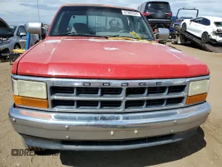 1996 Dodge Dakota z VIN 1B7GG23X1TS537628, wystawiony jako Copart lot #67980544 z przebiegiem 239 132 mil mil oraz Szkody całkowita. Historia ofert i sprzedaży dostępna na DreamBid. Obrazek 5.
