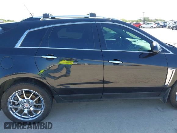 2013 Cadillac SRX Performance Collection with VIN 3GYFNHE35DS548632, listed as a IAAI auction lot 41990670 with 98,659 mi miles. Bid and sale history available at carsss.com. Image 13.