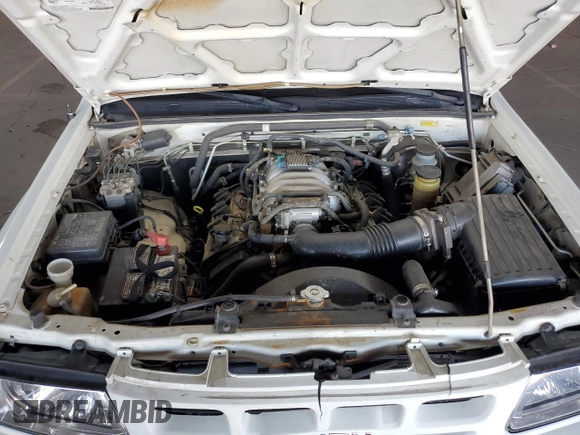 2000 Isuzu Rodeo S z VIN 4S2CK58W3Y4323965, wystawiony jako Copart lot #61189435 z przebiegiem 211 726 mil mil oraz Szkoda całkowita • Salvage title. Historia ofert i sprzedaży dostępna na DreamBid. Obrazek 11.