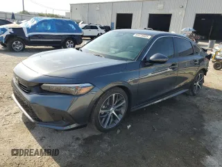 2024 Honda Civic Touring z VIN 2HGFE1F9XRH303580, wystawiony jako Copart lot #55578505 z przebiegiem 8 626 mil mil oraz Szkoda całkowita • Salvage title. Historia ofert i sprzedaży dostępna na DreamBid. Obrazek 1.