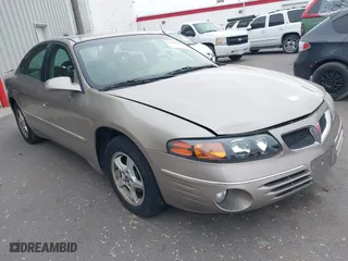 2001 Pontiac Bonneville SE with VIN 1G2HX54K714211864, listed as a IAAI auction lot 41390183 with 221,551 mi miles. Bid and sale history available at carsss.com. Image 1.