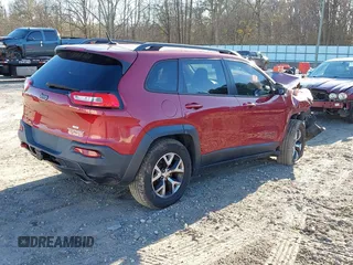 2014 Jeep Cherokee Trailhawk z VIN 1C4PJMBS8EW186277, wystawiony jako IAAI lot #41245653 z przebiegiem Nie podano mil oraz . Historia ofert i sprzedaży dostępna na DreamBid. Obrazek 4.