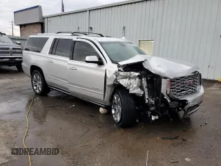 2019 GMC Yukon XL Denali with VIN 1GKS2HKJ6KR303603, listed as a Copart auction lot 45201225 with Not Provided miles and Salvage Title. Bid and sale history available at DreamBid. Image 4.