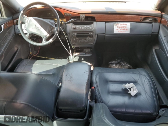 2002 Cadillac DeVille Limousine z VIN 1GEEH90Y72U550842, wystawiony jako Copart lot #52629735 z przebiegiem Nie podano mil oraz Szkoda całkowita • Salvage title. Historia ofert i sprzedaży dostępna na DreamBid. Obrazek 8.