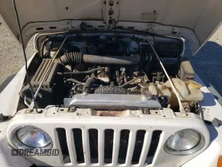 2006 Jeep Wrangler Sport Right Hand Drive with VIN 1J4F449S76P747454, listed as a Copart auction lot 77819214 with 184,763 mi miles and Salvage Title. Bid and sale history available at carsss.com. Image 11.