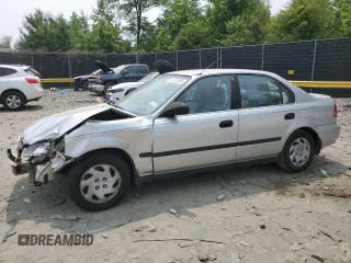 1997 Honda Civic LX z VIN 2HGEJ6677VH573069, wystawiony jako Copart lot #59739065 z przebiegiem 287 987 mil mil oraz Szkoda całkowita • Salvage title. Historia ofert i sprzedaży dostępna na DreamBid. Obrazek 1.