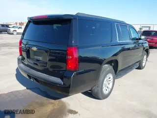 2019 Chevrolet Suburban LT with VIN 1GNSCHKC5KR192740, listed as a IAAI auction lot 41060098 with 243,257 mi miles. Bid and sale history available at carsss.com. Image 4.