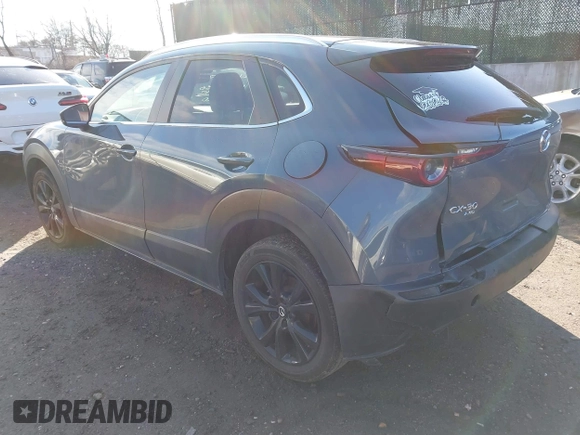 2023 Mazda CX-30 S Carbon Edition with VIN 3MVDMBCM3PM579345, listed as a IAAI auction lot 41689892 with 18,621 mi miles and . Bid and sale history available at DreamBid. Image 3.