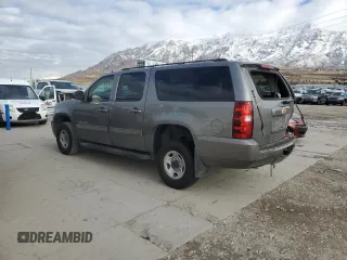 2012 Chevrolet Suburban LS with VIN 1GNWKLEG3CR308413, listed as a Copart auction lot 83671324 with 141,053 mi miles and Salvage title. Bid and sale history available at DreamBid. Image 2.