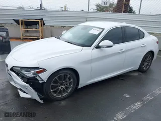 2019 Alfa Romeo Giulia with VIN ZARFAMANXK7600498, listed as a IAAI auction lot 41777643 with 100,492 mi miles. Bid and sale history available at carsss.com. Image 18.