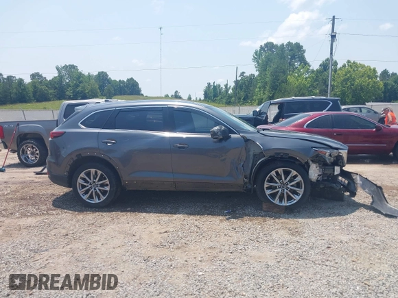 2018 Mazda CX-9 Grand Touring with VIN JM3TCADY7J0217595, listed as a IAAI auction lot 42381331 with 130,604 mi miles and . Bid and sale history available at DreamBid. Image 13.