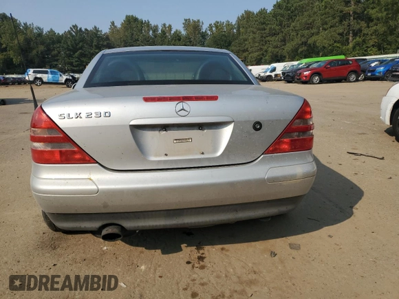 1999 Mercedes-Benz SLK-Class with VIN WDBKK47F9XF127582, listed as a Copart auction lot 71345494 with 187,302 mi miles and Salvage Title. Bid and sale history available at carsss.com. Image 6.