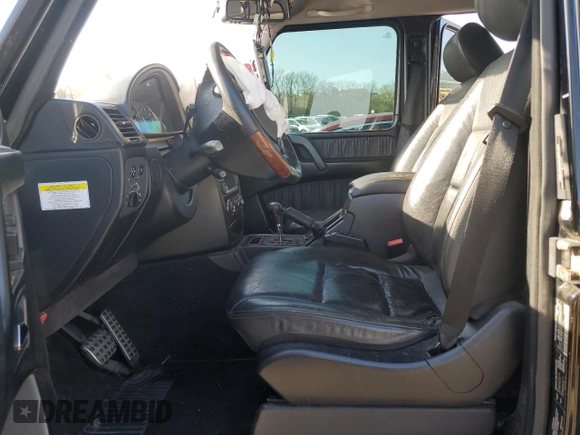 2009 Mercedes-Benz G with VIN WDCYR37E59X179789, listed as a Copart auction lot 48282934 with 154,393 mi miles and Salvage Title. Bid and sale history available at DreamBid. Image 7.