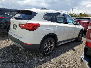 2018 BMW X1 sDrive28i with VIN WBXHU7C36J5H42760, listed as a Copart auction lot 49616663 with 89,603 mi miles. Bid and sale history available at carsss.com. Image 3.