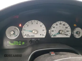 2003 Ford Thunderbird Deluxe with VIN 1FAHP60A03Y108186, listed as a Copart auction lot 86729574 with 79,624 mi miles and Salvage Title. Bid and sale history available at DreamBid. Image 9.