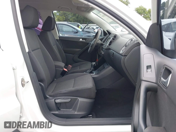 2017 Volkswagen Tiguan S with VIN WVGAV7AX8HK046181, listed as a IAAI auction lot 42493160 with 65,609 mi miles and . Bid and sale history available at DreamBid. Image 5.