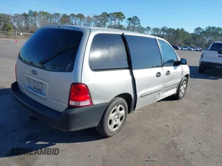 2006 Ford Freestar Cargo with VIN 2FTZA54606BA63798, listed as a IAAI auction lot 41399072 with 263,730 mi miles. Bid and sale history available at carsss.com. Image 4.