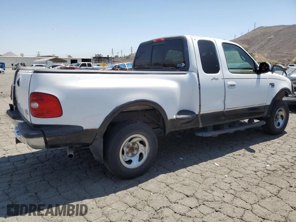 1999 Ford F-150 XL with VIN 1FTRX08LXXKA81637, listed as a Copart auction lot 64637375 with Not provided miles and Salvage title. Bid and sale history available at DreamBid. Image 3.