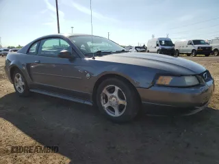 2004 Ford Mustang Standard z VIN 1FAFP40654F138305, wystawiony jako Copart lot #65882195 z przebiegiem 89 404 mil mil oraz Czysty tytuł • Clean title. Historia ofert i sprzedaży dostępna na DreamBid. Obrazek 4.
