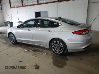 2017 Ford Fusion Hybrid Titanium with VIN 3FA6P0RU4HR223512, listed as a Copart auction lot 58739435 with 174,604 mi miles and Clean title. Bid and sale history available at DreamBid. Image 2.