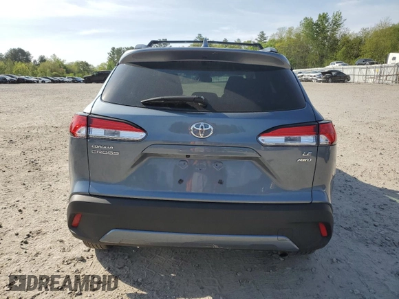 2022 Toyota Corolla Cross LE with VIN 7MUBAABG6NV041555, listed as a Copart auction lot 56567225 with 26,736 mi miles and Salvage title. Bid and sale history available at DreamBid. Image 6.
