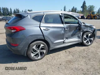 2016 Hyundai Tucson Limited with VIN KM8J33A26GU137391, listed as a IAAI auction lot 42088662 with 72,048 mi miles. Bid and sale history available at carsss.com. Image 4.