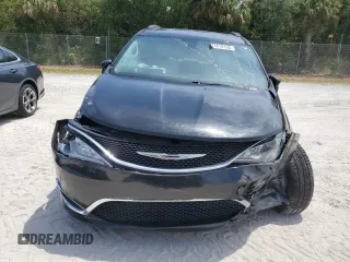 2017 Chrysler Pacifica Touring L with VIN 2C4RC1BG7HR551641, listed as a Copart auction lot 51810185 with 66,860 mi miles and Salvage Title. Bid and sale history available at DreamBid. Image 5.