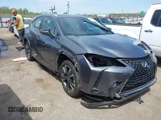 2021 Lexus UX with VIN JTHP9JBH1M2040593, listed as a IAAI auction lot 42024493 with 33,394 mi miles. Bid and sale history available at carsss.com. Image 1.