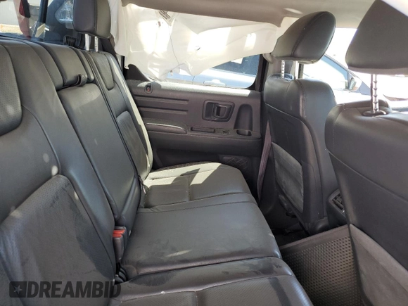 2013 Honda Ridgeline RTL z VIN 5FPYK1F5XDB010362, wystawiony jako Copart lot #50763704 z przebiegiem 134 745 mil mil oraz Szkoda całkowita • Salvage title. Historia ofert i sprzedaży dostępna na DreamBid. Obrazek 10.