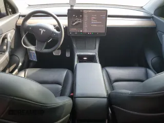 2022 Tesla Model Y Performance with VIN 7SAYGDEF4NF447462, listed as a Copart auction lot 58306595 with 61,671 mi miles and Non repairable. Bid and sale history available at DreamBid. Image 8.
