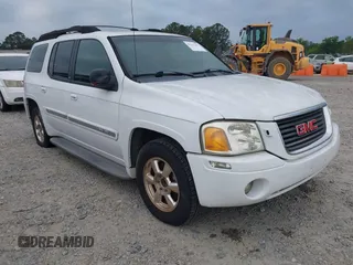 2003 GMC Envoy SLT with VIN 1GKES16S936189719, listed as a IAAI auction lot 42122292 with 289,810 mi miles and . Bid and sale history available at DreamBid. Image 1.