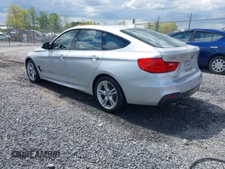 2014 BMW 3 Series 328i Gran Turismo xDrive z VIN WBA3X5C51ED556554, wystawiony jako IAAI lot #42149391 z przebiegiem 189 624 mil mil oraz . Historia ofert i sprzedaży dostępna na DreamBid. Obrazek 3.