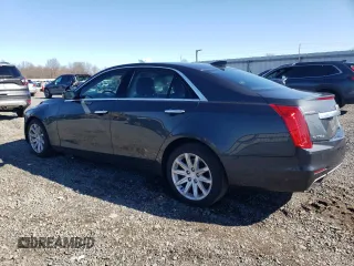 2015 Cadillac CTS AWD with VIN 1G6AW5SX8F0134518, listed as a Copart auction lot 50009215 with 91,545 mi miles and Salvage title. Bid and sale history available at DreamBid. Image 2.