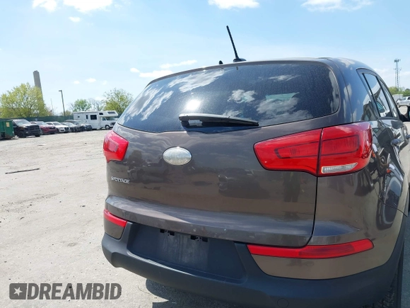 2014 Kia Sportage LX with VIN KNDPBCAC4E7629701, listed as a IAAI auction lot 42097140 with 183,552 mi miles and . Bid and sale history available at carsss.com. Image 12.