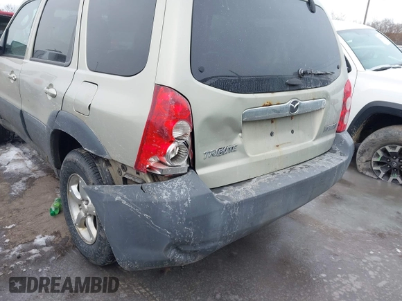 2005 Mazda Tribute i with VIN 4F2YZ02Z35KM57658, listed as a IAAI auction lot 41547562 with 131,303 mi miles and . Bid and sale history available at carsss.com. Image 6.