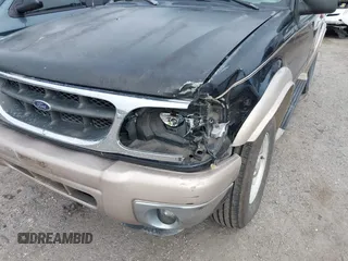 2000 Ford Explorer Eddie Bauer z VIN 1FMZU64EXYZA74923, wystawiony jako IAAI lot #41504088 z przebiegiem 254 021 mil mil oraz . Historia ofert i sprzedaży dostępna na DreamBid. Obrazek 6.