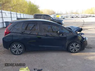 2015 Honda Fit EX with VIN 3HGGK5G82FM744840, listed as a IAAI auction lot 42138045 with 91,321 mi miles and . Bid and sale history available at DreamBid. Image 13.
