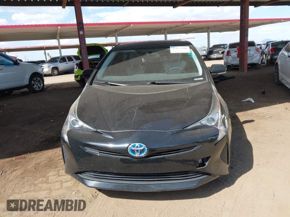 2016 Toyota Prius Two with VIN JTDKBRFUXG3503142, listed as a IAAI auction lot 42027700 with 185,319 mi miles. Bid and sale history available at carsss.com. Image 13.